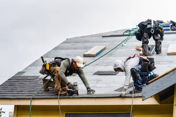 Professional Gutter Installation technician working in Townsend, MA